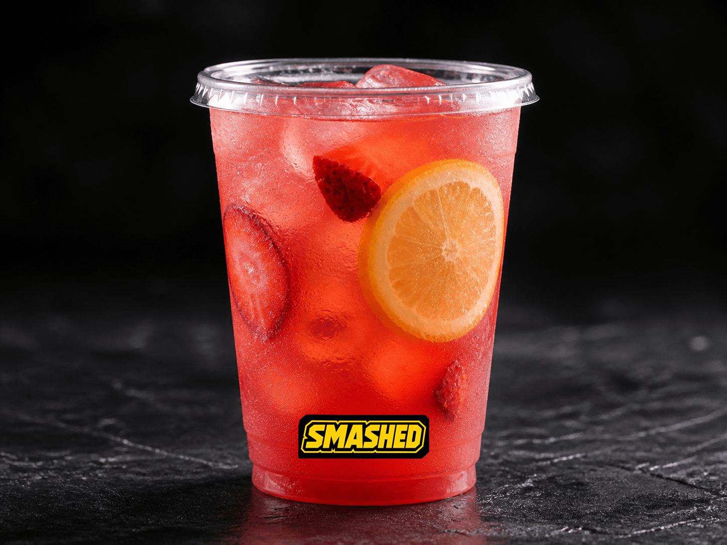 Strawberry lemonade in a branded clear cup