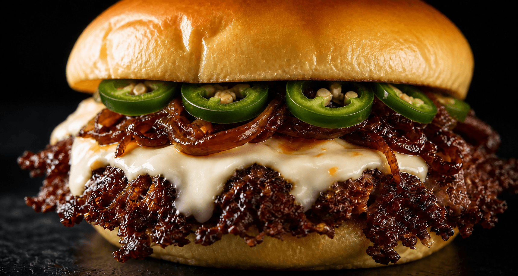 Jalapeno Smash burger with white American cheese and fresh sliced jalapenos