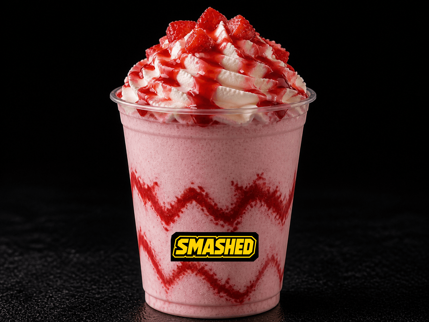 Strawberry shake in a branded clear cup